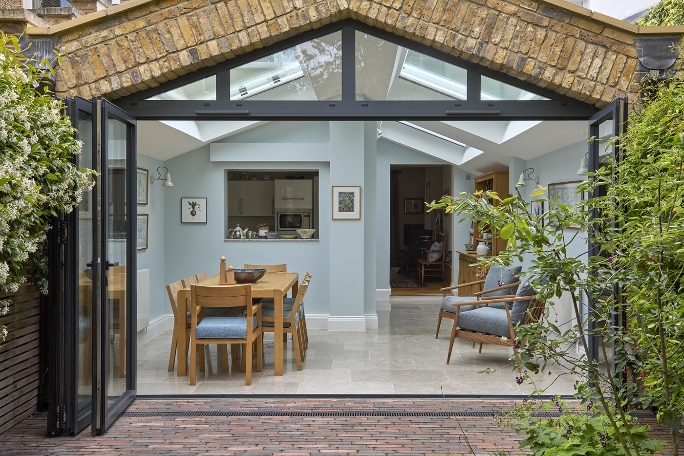 The glazed gable at Ceylon Road seen from the garden, with the dining space beyond