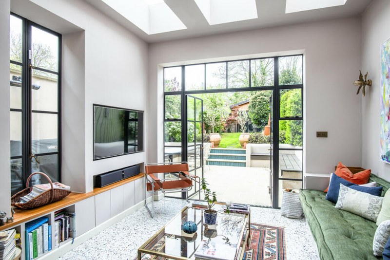 Open-plan living space at Chevening Road with steel glazing to the garden
