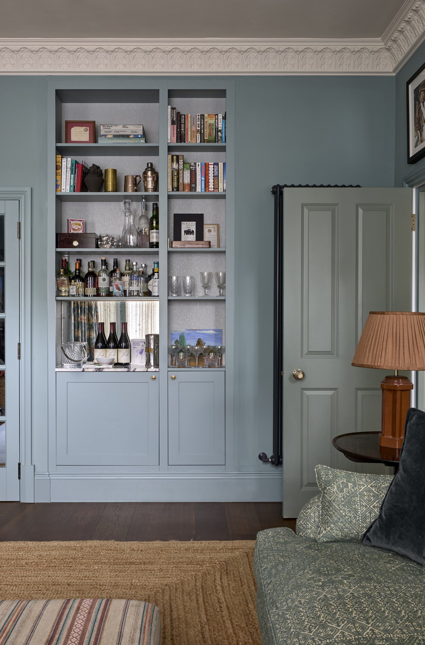 Fitted bookcase and drinks joinery at Melrose Gardens